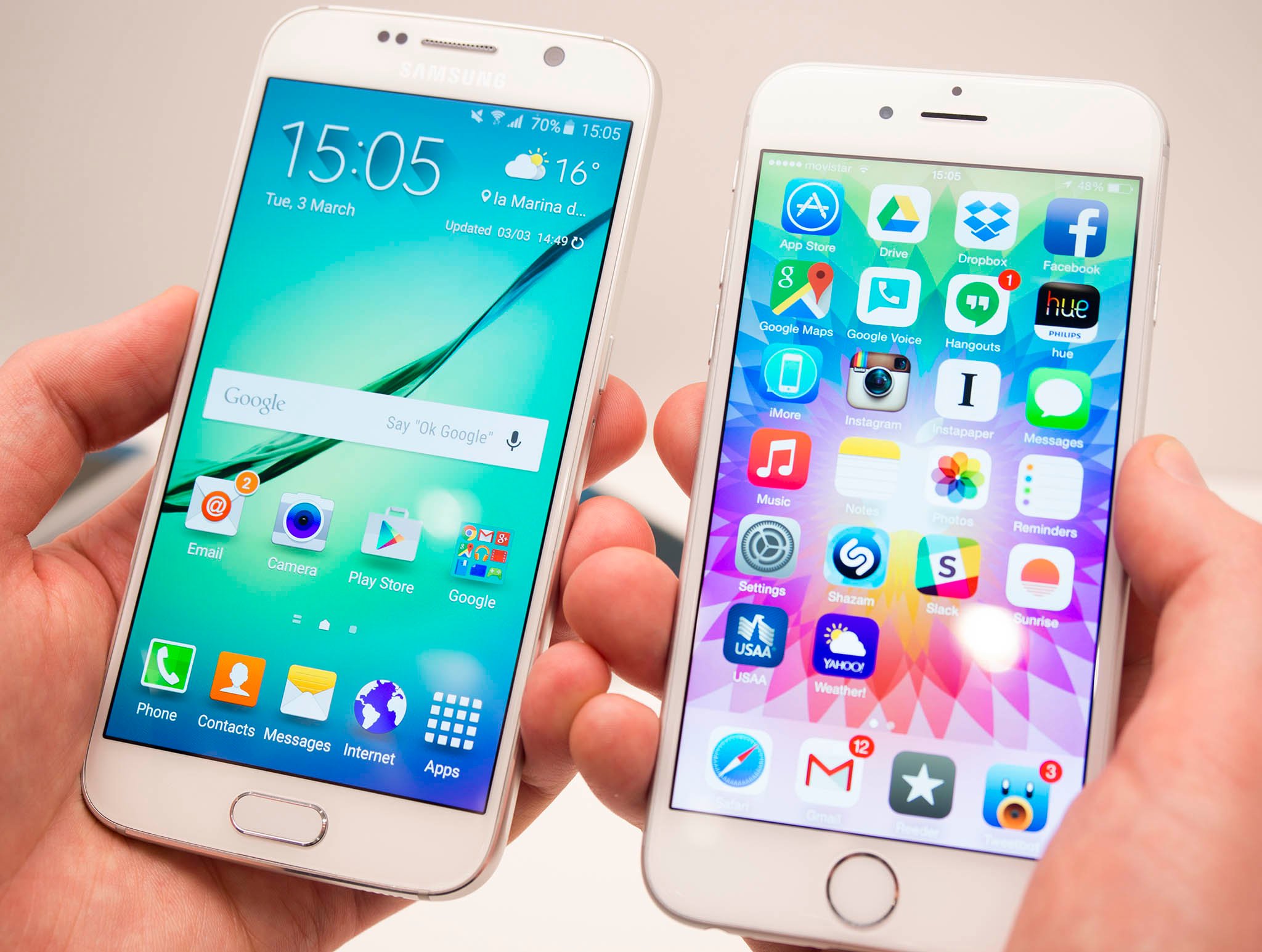 galaxy-s6-iphone-6-comparison-side-hands.jpg